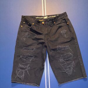 Jordan Craig artisan edition- Black ripped shorts with a baggy fit